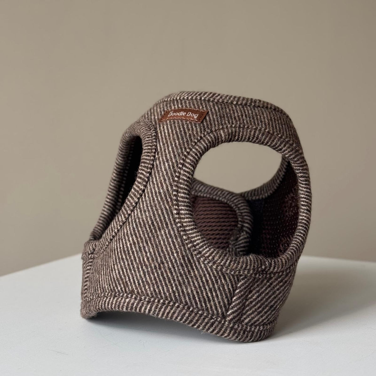 Nora kropssele i tweed